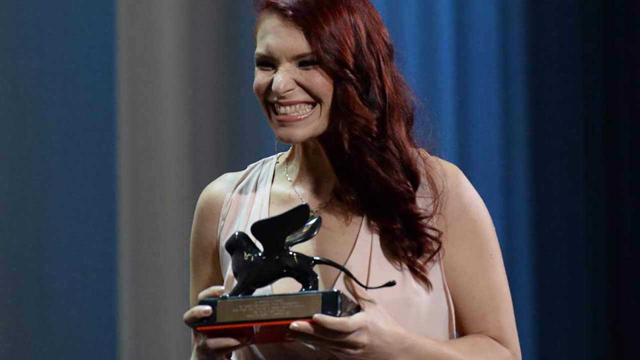 woman with award